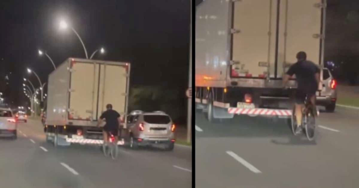 Ciclista Arrisca a Vida ao Andar Colado em Caminhão